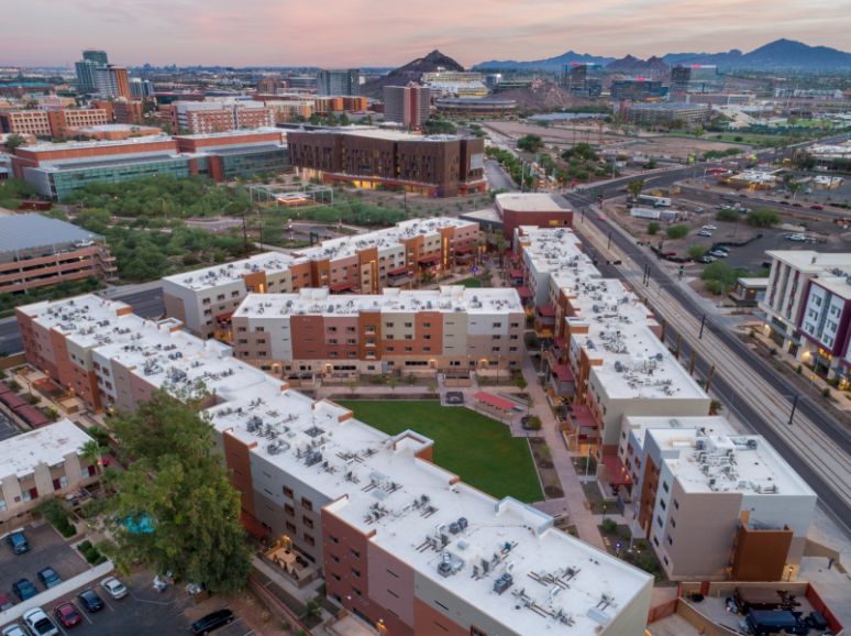 Aerial view of a residential complex at dusk